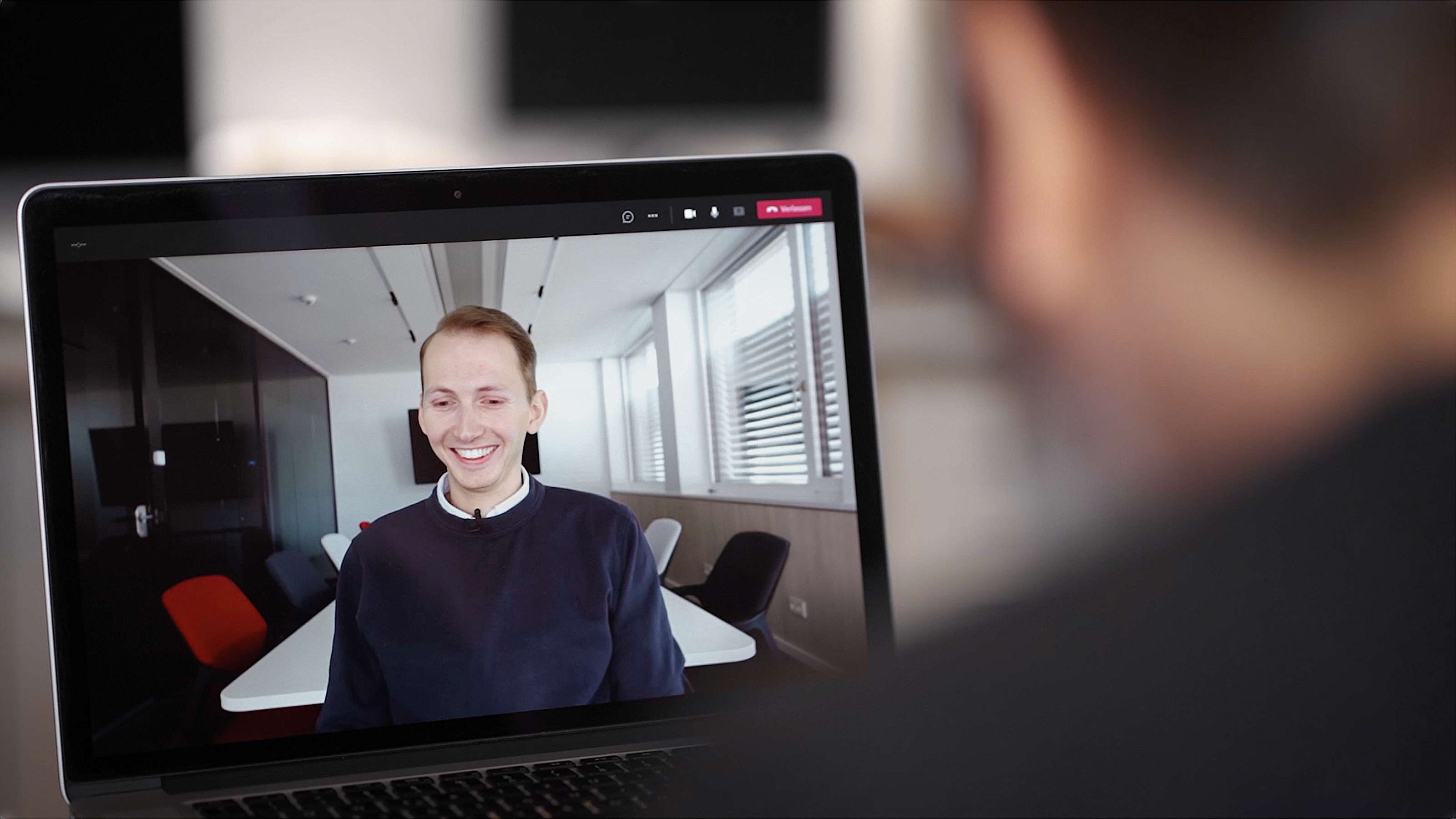 During a video interview, you can see the interviewee in a tablet.