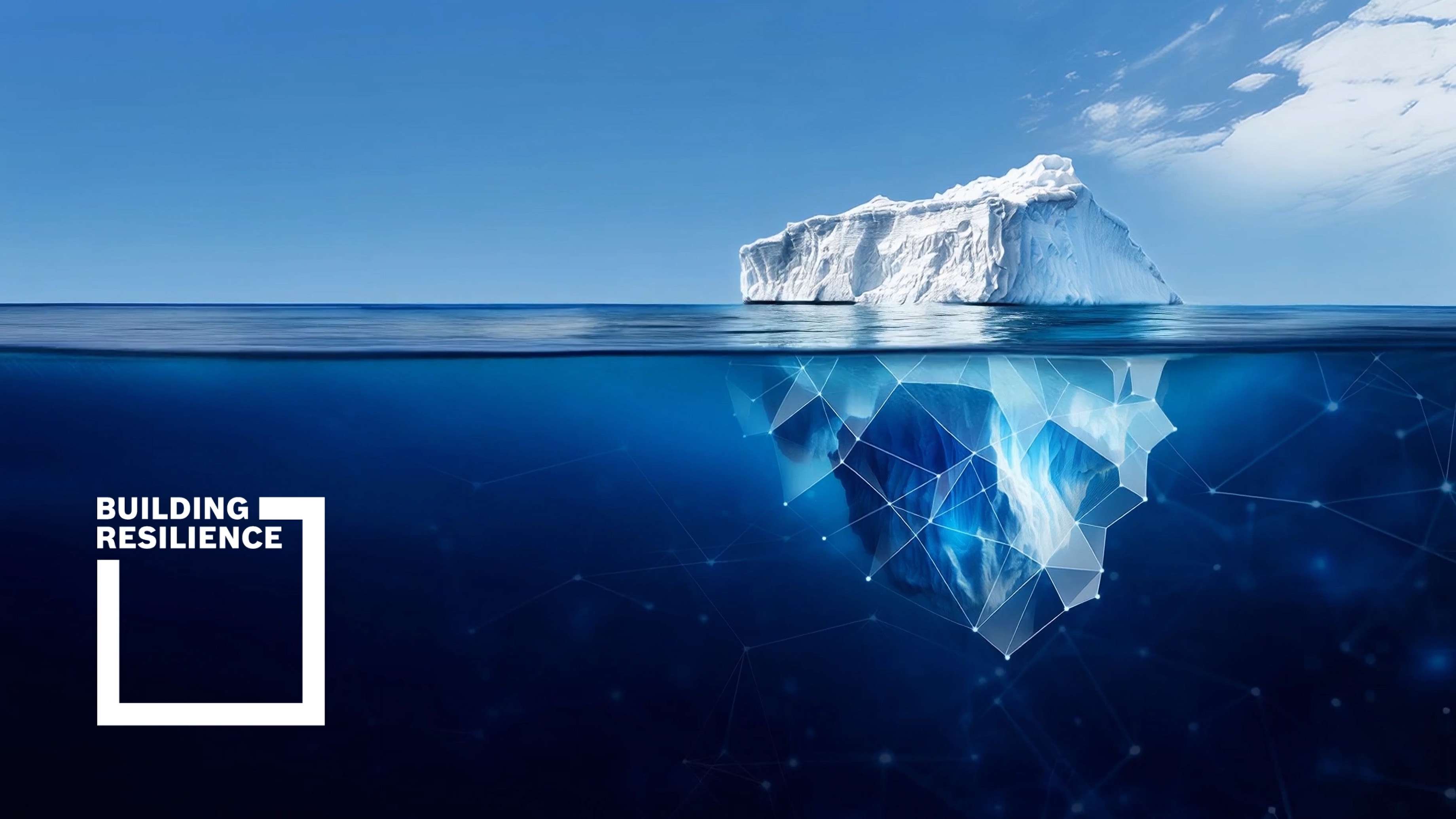 An iceberg drifts in the sea and forms complex structures beneath the water's surface to symbolise resilience.