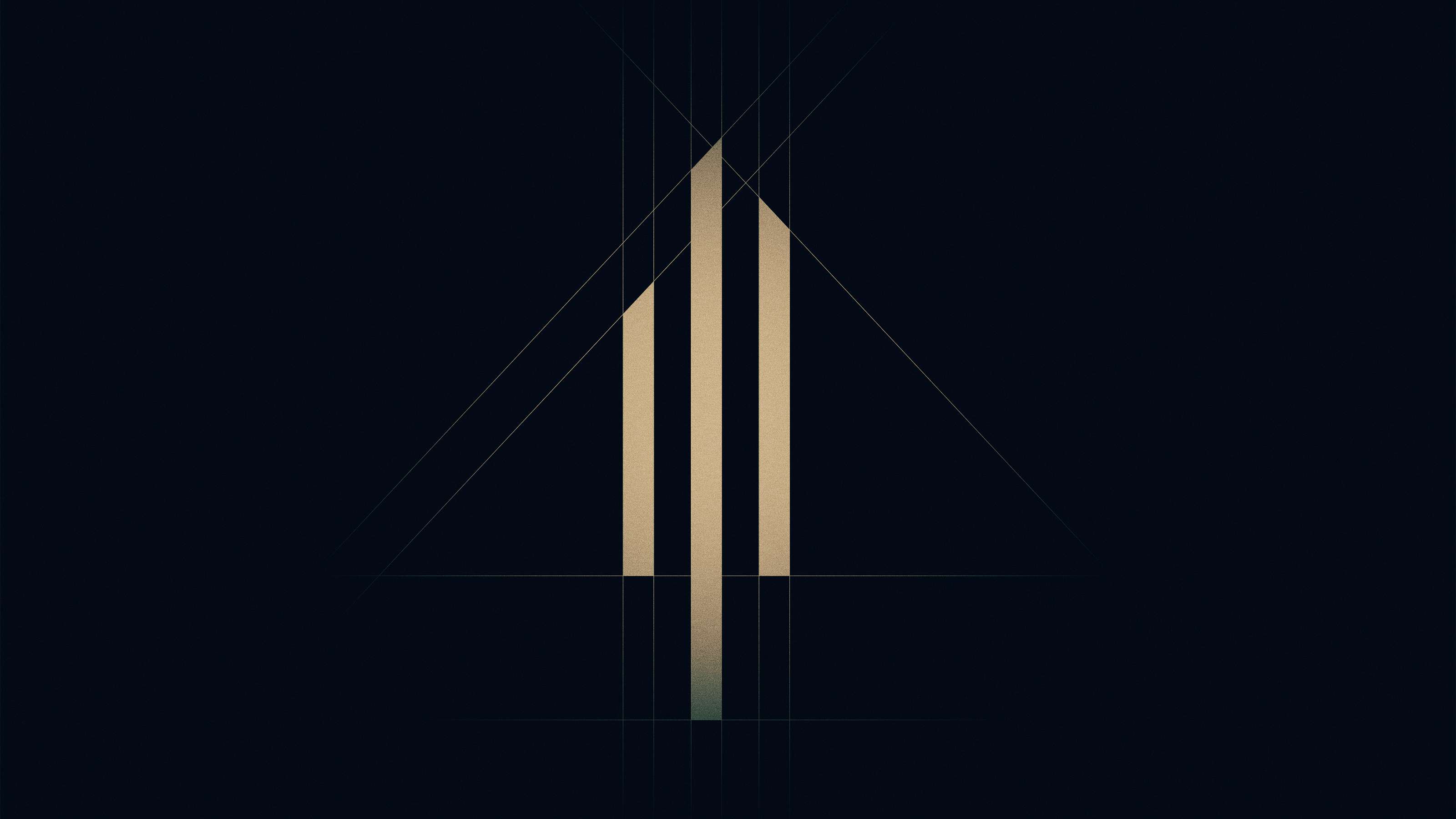 Figurative mark of Hamburger Grund in gold on a black background