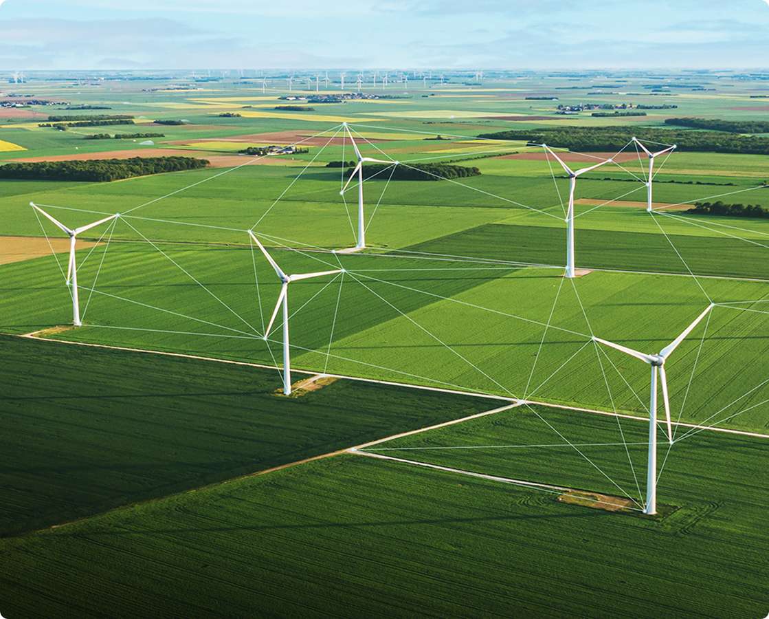 Six wind turbines on agricultural land are an example of critical infrastructure in the energy sector.